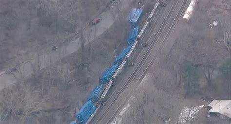 Officials: No hazardous materials aboard cargo train cars that derailed in Ayer